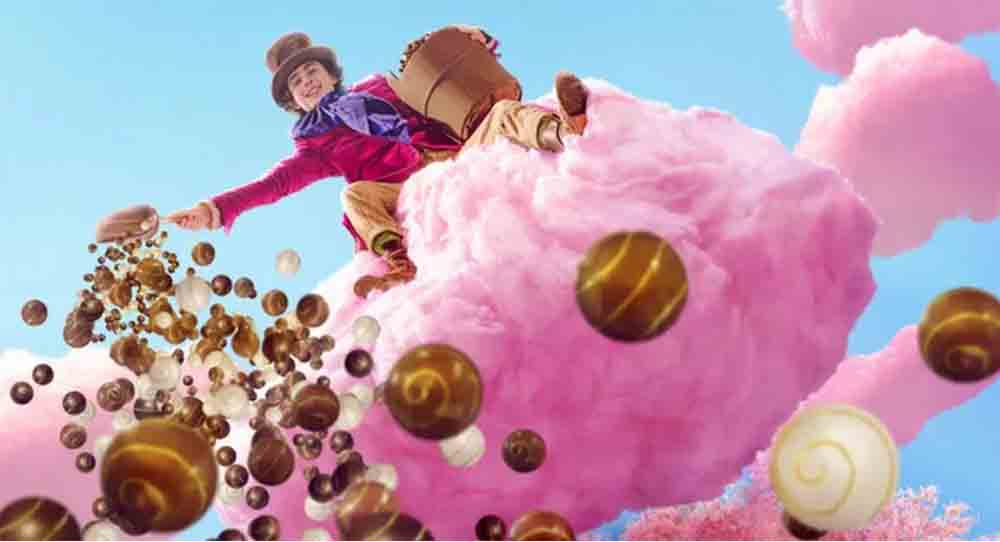 El Willy Wonka de Timothée Chalamet repartiendo sus bombones