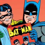 Batman y Robin leyendo sus aventuras